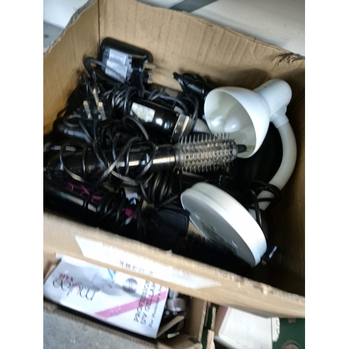 145 - 2 Boxes containing assorted electronics including hair rollers, shavers, Binatone TV master