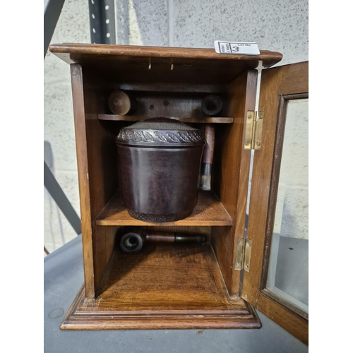 3 - Smoker's cabinet including pipes and Bakelite tobacco jar