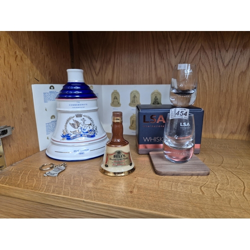 454 - Collection of Bells Whisky collectibles and a set of LSA International Whisky glasses etc