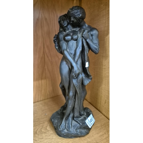 461 - A 'lovers' resin figure signed R Cameron