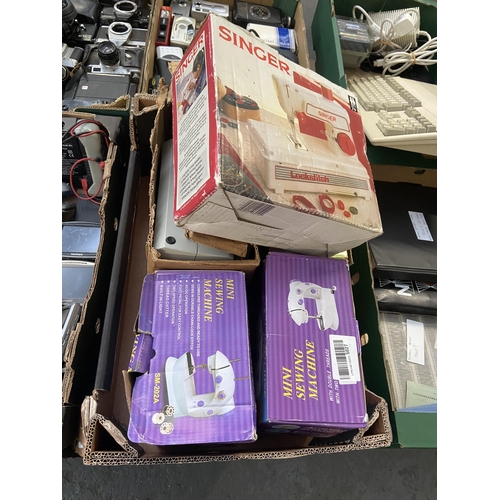 485 - Box containing a quantity of sewing machines including Singer