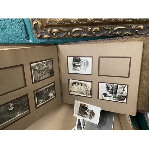 544 - Box containing a quantity of vintage black and white photographs and post cards