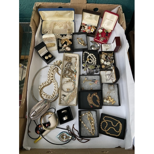 553 - Box containing costume jewellery and a Ronson lighter