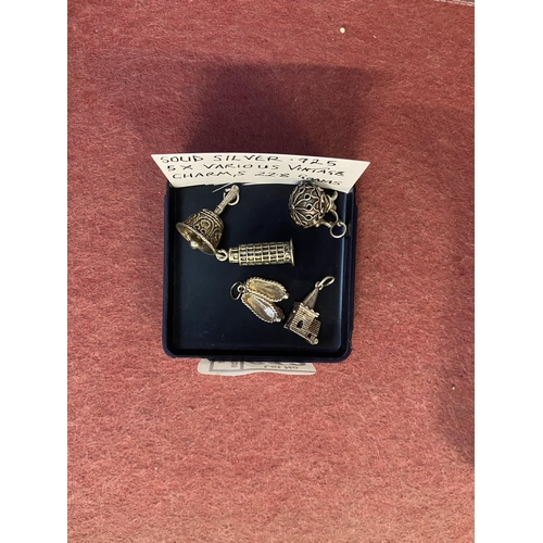 612 - 5 Vintage silver charms, 22.8g