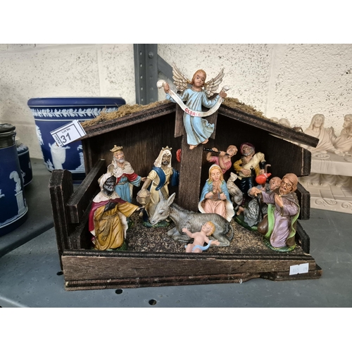 31 - Resin 'Last Supper' and a nativity scene