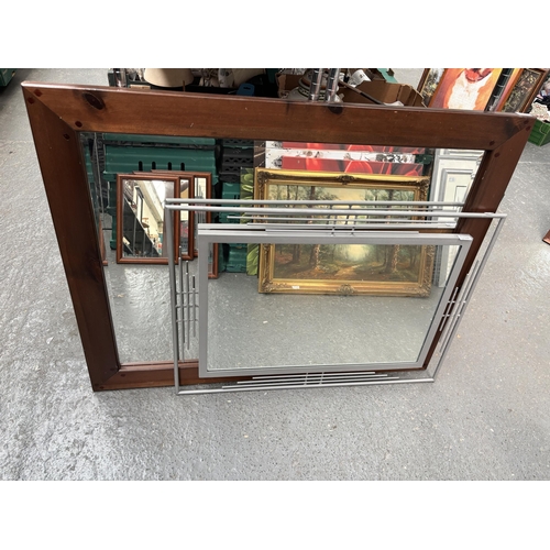 108 - Modern metal framed mirror plus one other