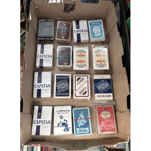 124 - Box containing collectible playing cards
