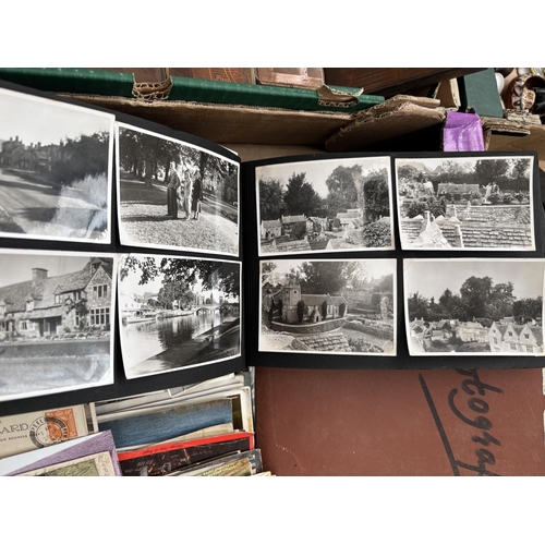 141 - Box containing postcards and black & white photographs
