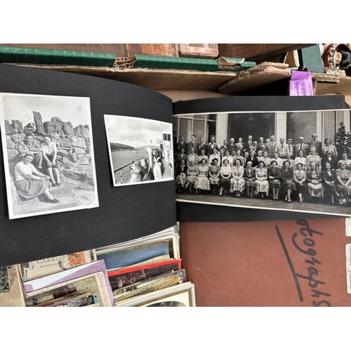 141 - Box containing postcards and black & white photographs