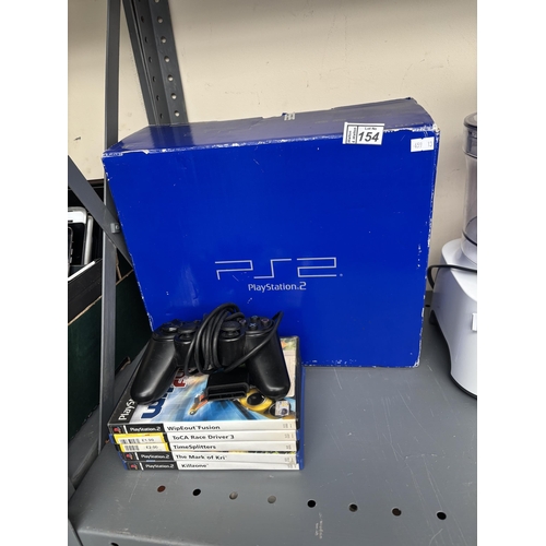 154 - Boxed PlayStation 2 and games