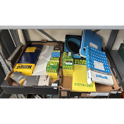 254 - 2 Boxes containing fuel and oil filters etc