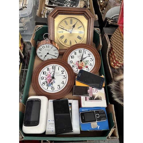 84 - Box containing clocks and mobile phones