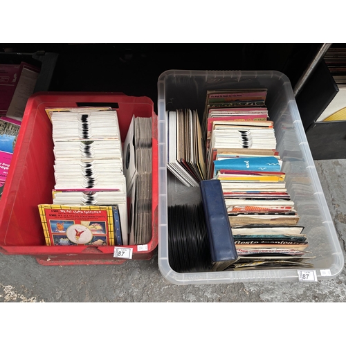 87 - 2 Boxes containing assorted 45s including Keith Harris and Orville