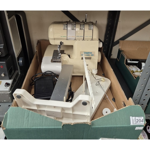 204 - Box containing Creative Pro-Lock 300 overlocker