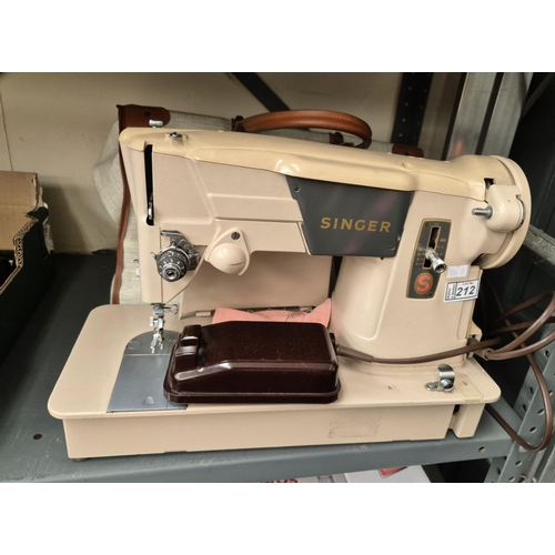 212 - Singer electric sewing machine