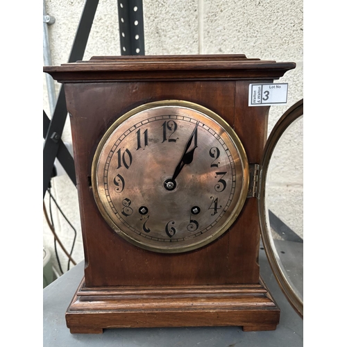 3 - W & H Son mantle clock featuring glazed side and top panels (key included)