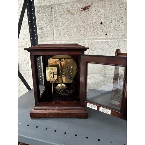 3 - W & H Son mantle clock featuring glazed side and top panels (key included)