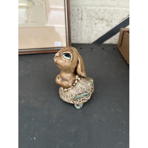 50 - Box containing Perndelfin plates and rabbits including Margot with pleated skirt