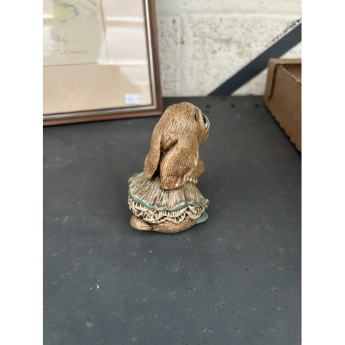 50 - Box containing Perndelfin plates and rabbits including Margot with pleated skirt