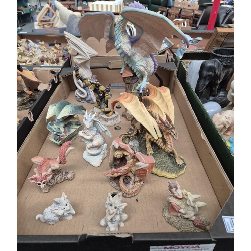 Box containing Enchantica mythical creatures including dragons and a goblin