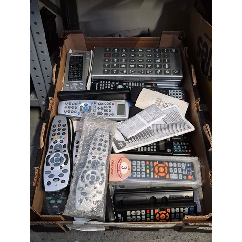 Box containing assorted remote controls, some new