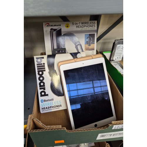 185 - Box containing wireless headsets and an Ipad