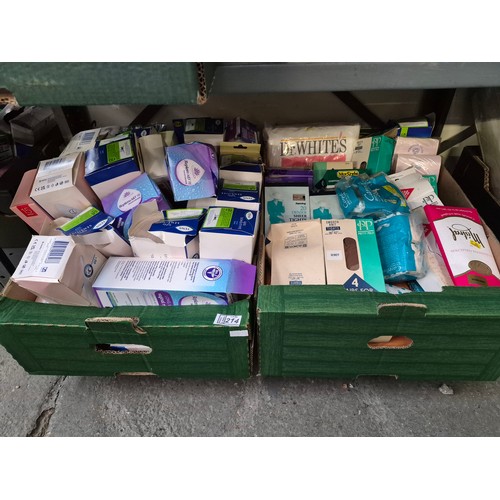 214 - 2 Boxes containing vintage tights, ladies Tena wear etc
