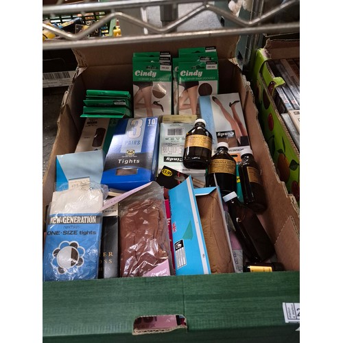 228 - Box containing assorted tights and aromatheraphy oils