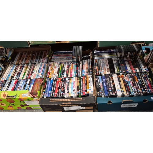 231 - 3 Boxes containing a quantity of DVDs