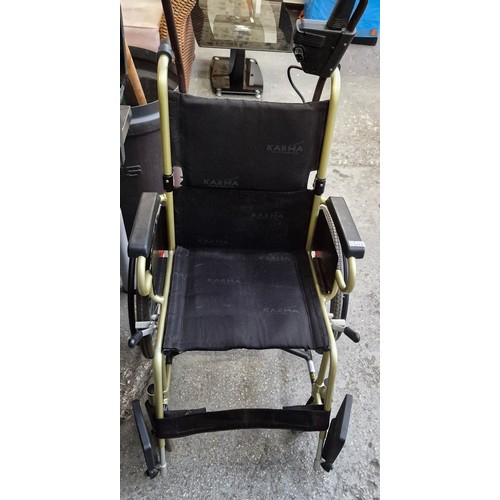318 - Karma fold away wheelchair