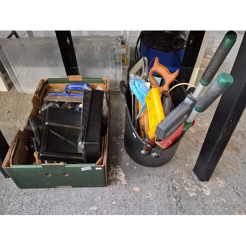 335 - Box and builders tub containing assorted tools and decorating supplies