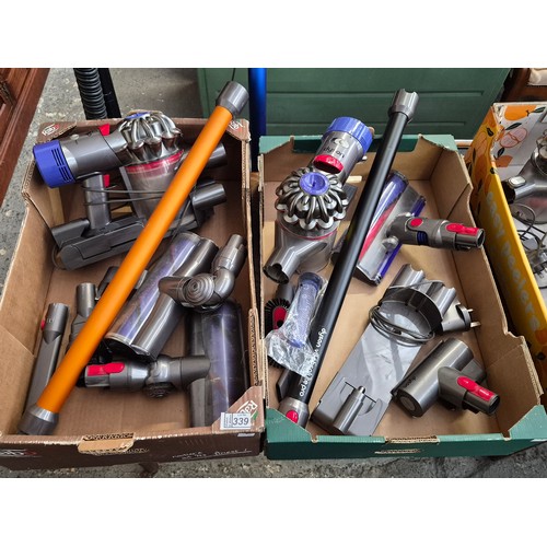 339 - 2 Boxes containing Dyson vacuums and parts etc