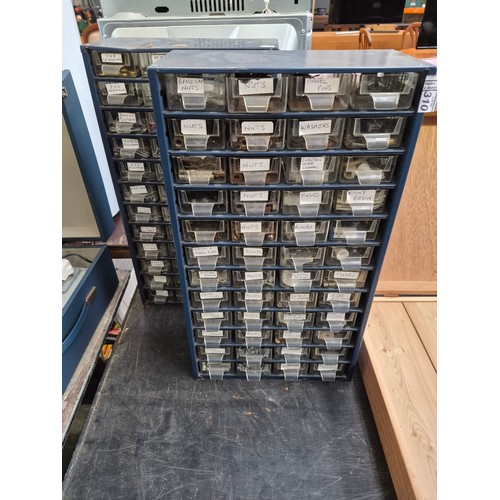 310 - 2 Sets of compartment drawers and contents