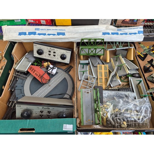 345 - 2 Boxes containing railway track, accessories and 2 'Duette' twin supply power units