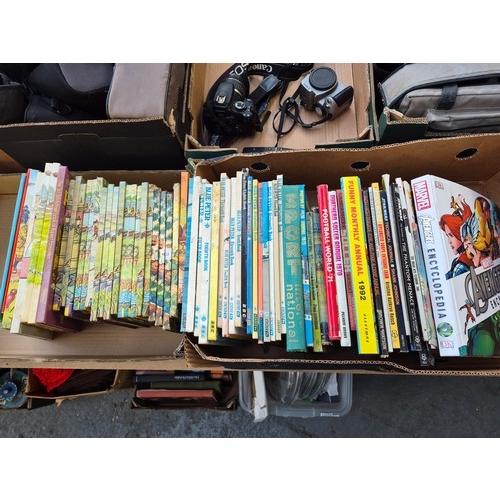 353 - 2 Boxes containing a quantity of annuals including Rupert, Blue Peter and Star Wars