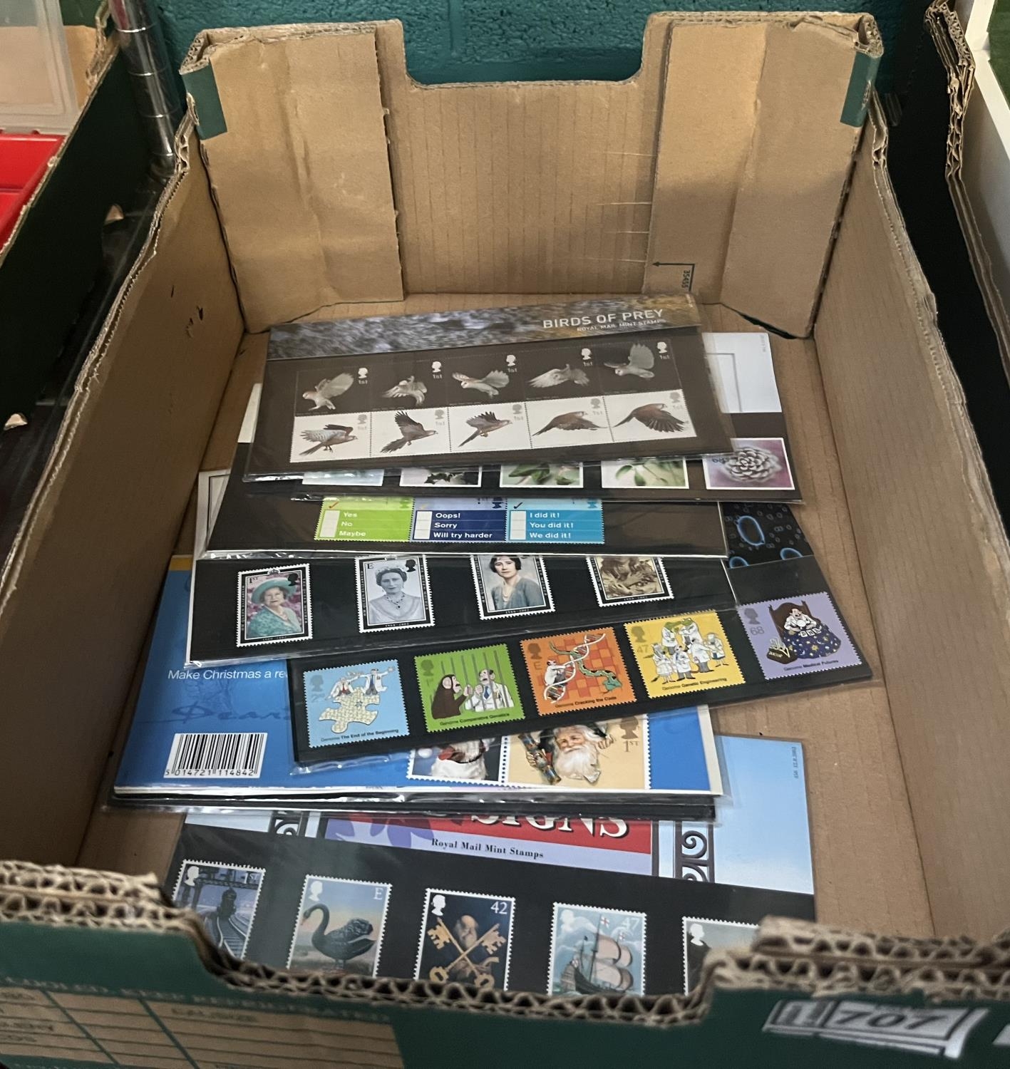 Box containing a quantity of stamp sets (25 usable first class stamps)