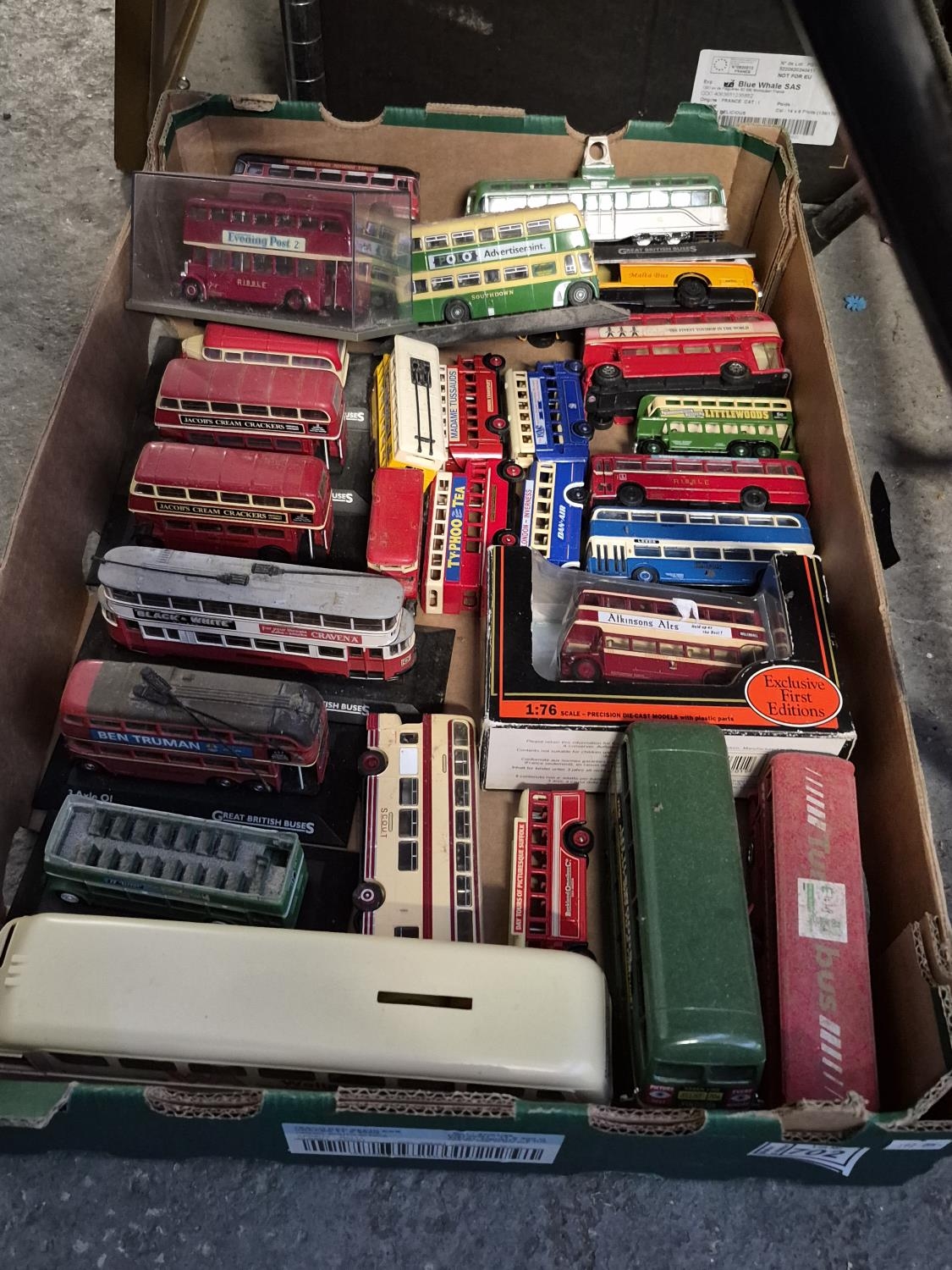 Box containing 'Great British Buses' models including London Transport