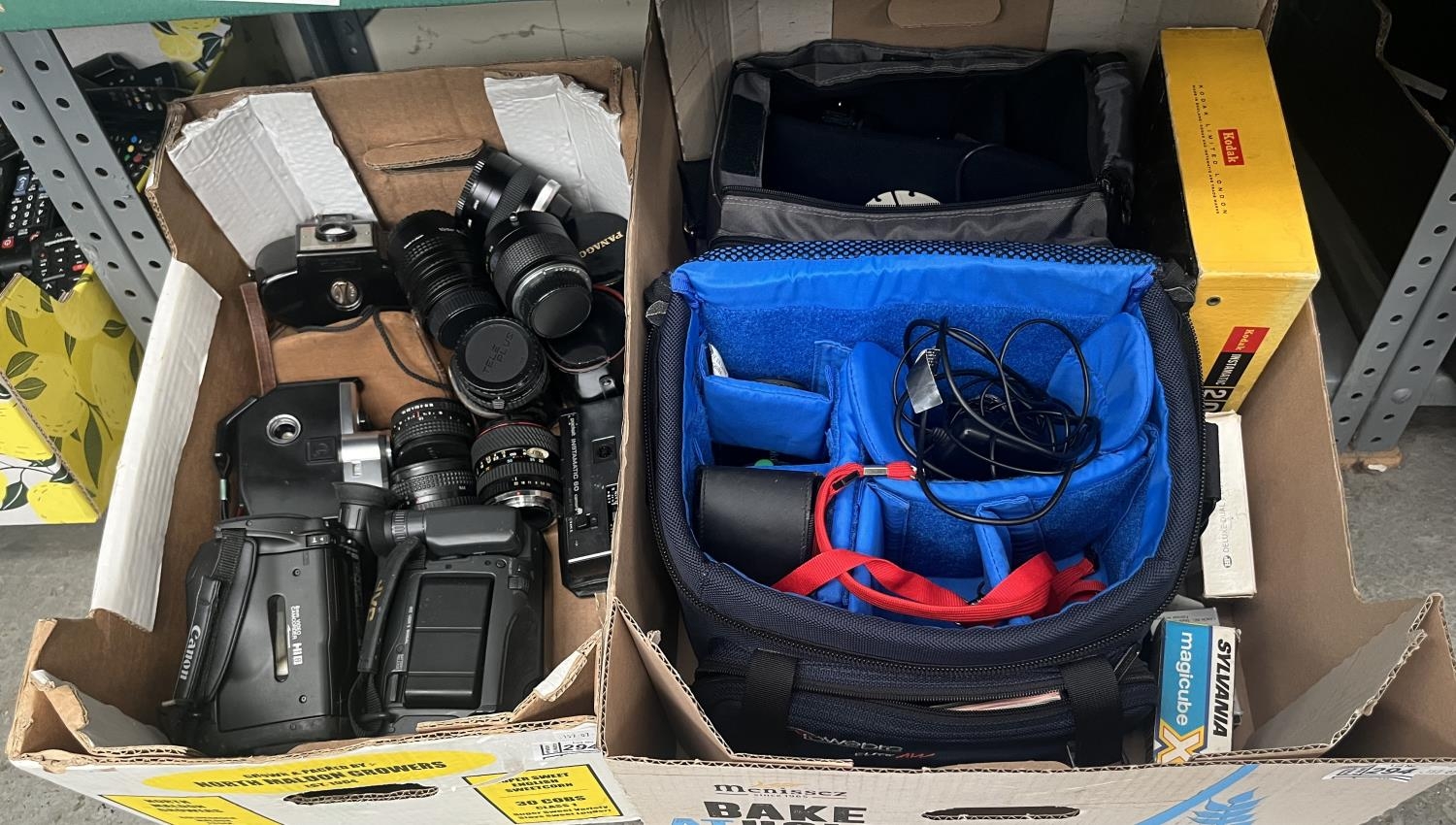 2 Boxes containing a quantity of cameras, video cameras and lenses etc