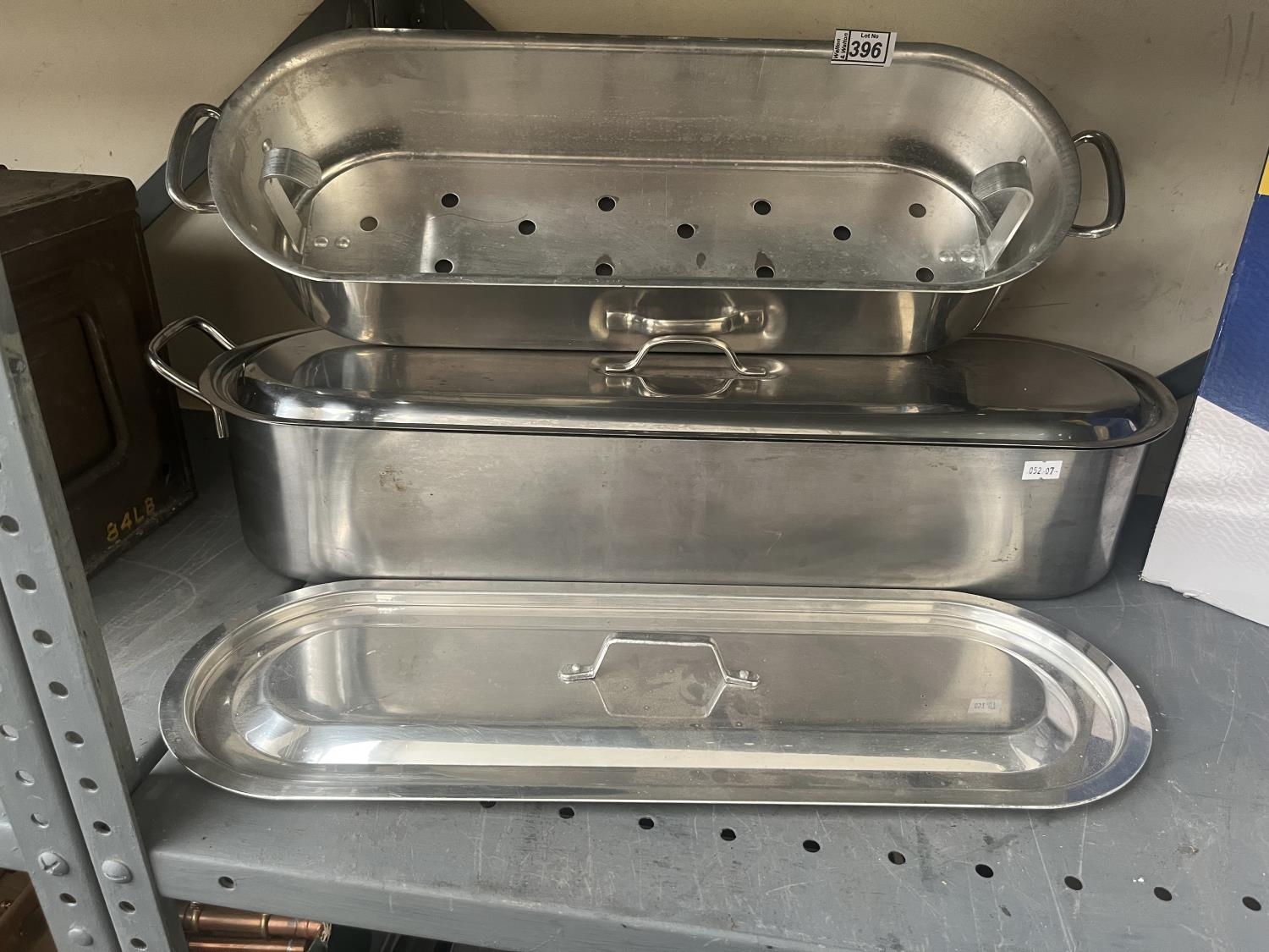 Pair of large fish kettles