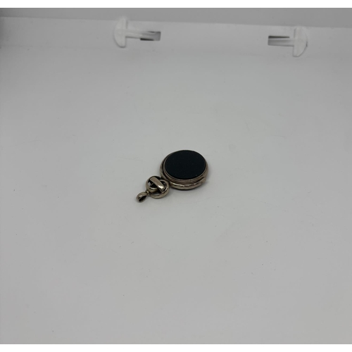 11 - Gold spinning Albert charm featuring bloodstone and carnelian (tests as approx 10ct, no hallmark), 1... 