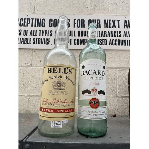 108 - Large 4.5L Bell's Whisky bottle and a 300cl Bacardi bottle