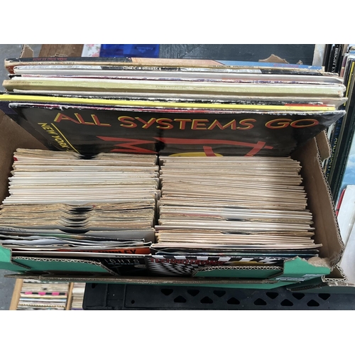 180 - Box containing LPs and singles including Deep Heat and The Bunnies Of London