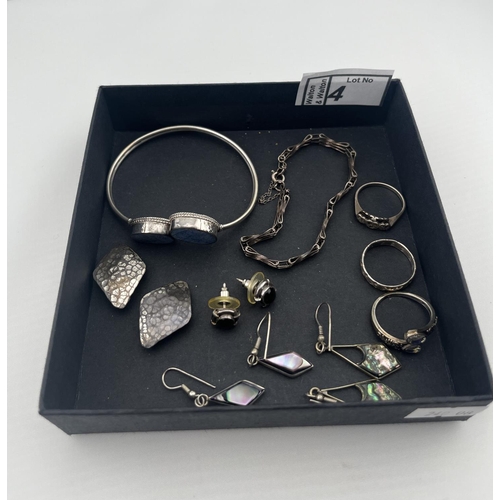 4 - Quantity of silver jewellery including a stone set bangle