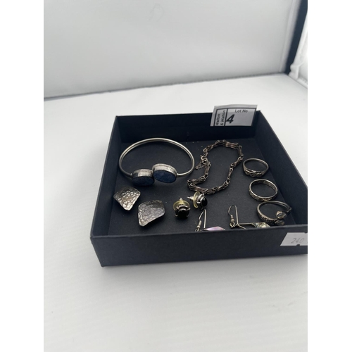 4 - Quantity of silver jewellery including a stone set bangle