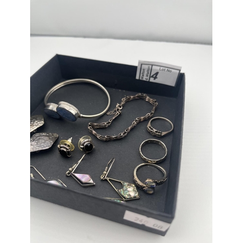 4 - Quantity of silver jewellery including a stone set bangle