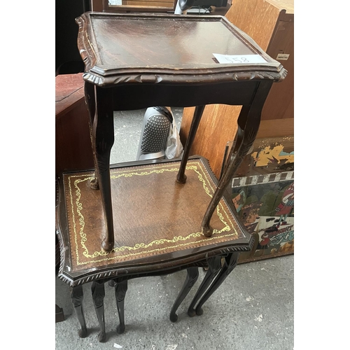 558 - Nest of leather top table plus one other