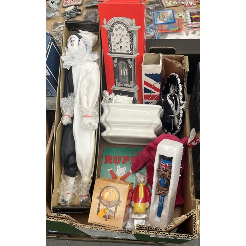 718 - Box containing a die cast 'globe' pencil sharpener, miniature pendulum clock and Pierrot Harlequin d... 