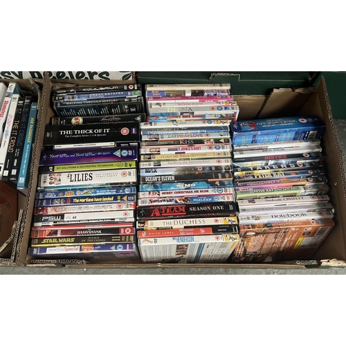 720 - 2 Boxes containing a quantity of DVDs