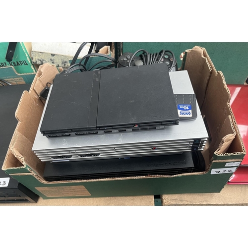 722 - Box containing 3 PlayStation 2 consoles and controllers