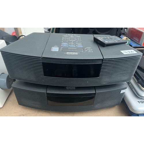 726 - 2 Bose Wave radios and a remote (AWRCIG)